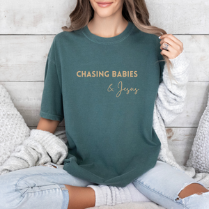 CHASING BABIES & JESUS GRAPHIC TEE IN BLUE SPRUVE-GRAPHIC TEE-MODE-Couture-Boutique-Womens-Clothing