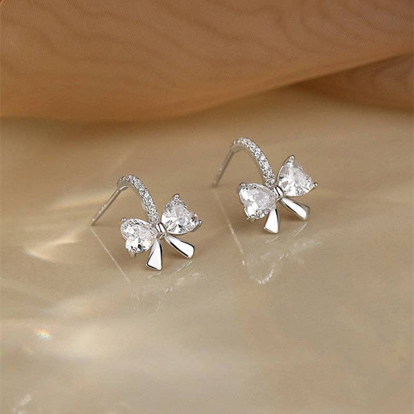 DAINTY BOW TIE WEDDING HOOP EARRING IN SILVER-EARRINGS-MODE-Couture-Boutique-Womens-Clothing