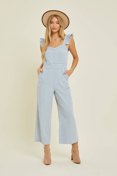 DENIM JUMPSUIT WITH RUFFLE SHOULDER STRAP IN CHAMBRAY-JUMPSUIT-MODE-Couture-Boutique-Womens-Clothing