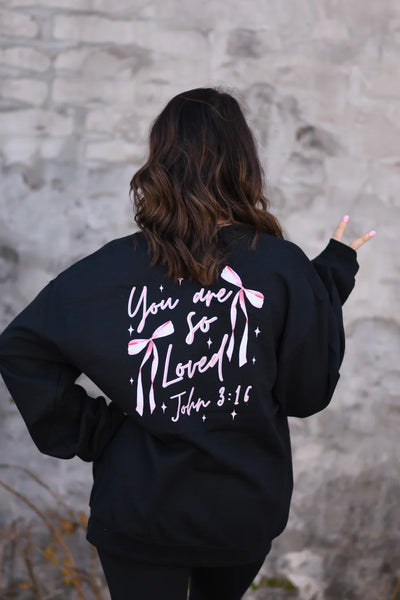 COQUETTE BOW YOU ARE SO LOVED JOHN 3:16 GRAPHIC SWEATSHIRT IN BLACK-Graphic Sweatshirt-MODE-Couture-Boutique-Womens-Clothing