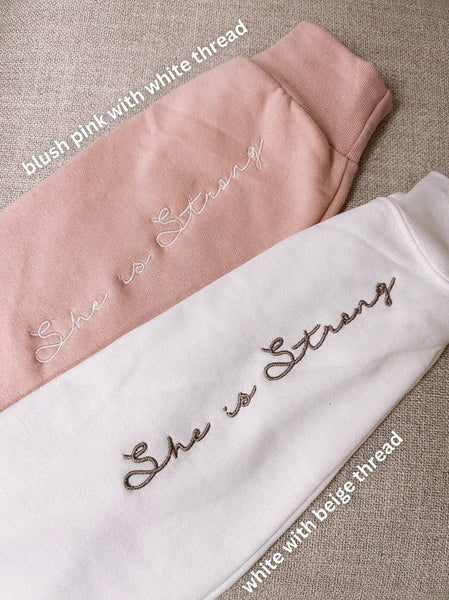 SHE IS STRONG EMBROIDERED CREWNECK SWEATSHIRT IN BLUSH PINK-MODE-Couture-Boutique-Womens-Clothing