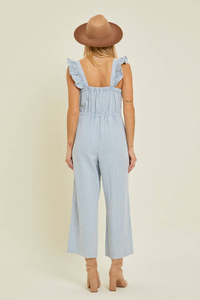 DENIM JUMPSUIT WITH RUFFLE SHOULDER STRAP IN CHAMBRAY-JUMPSUIT-MODE-Couture-Boutique-Womens-Clothing